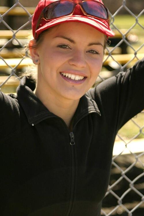 Sara Sexton has a little fun in the park and a red baseball cap
