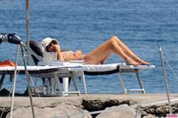 Helena Christensen in a bikini